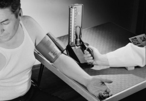 Doctor taking mans blood pressure Poster Print - Item # VARSAL255421363