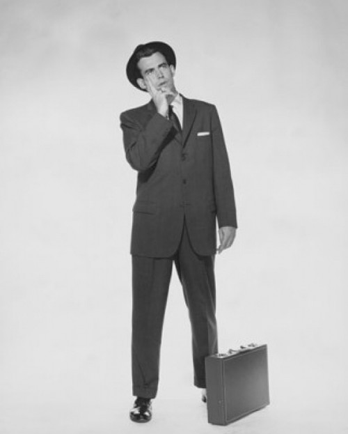 Businessman standing with a briefcase Poster Print - Item # VARSAL25527986