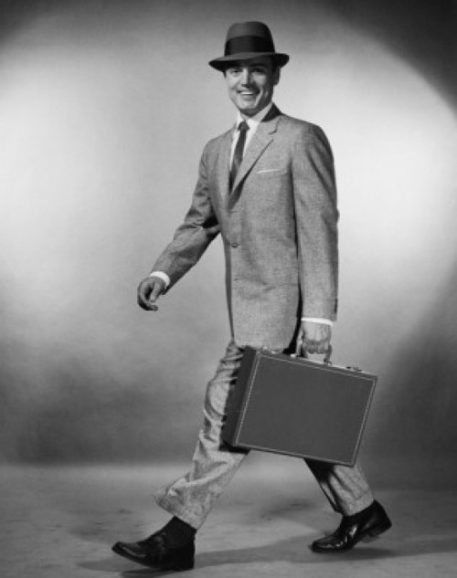 Portrait of a businessman walking carrying a briefcase Poster Print - Item # VARSAL25548134