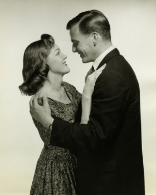 Side profile of a young couple embracing Poster Print - Item # VARSAL2552965