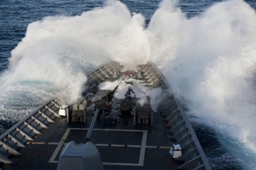 Philippine Sea, September 24, 2012 - The bow of the Ticonderoga-class guided-missile cruiser USS Cowpens plows through a wave while underway in rough seas. Poster Print - Item # VARPSTSTK106305M