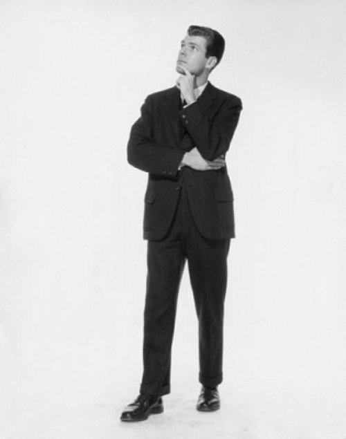 Businessman standing with his hand on his chin Poster Print - Item # VARSAL2555366 Businessman standing with his hand on his chin Poster Print - Item # VARSAL2555366