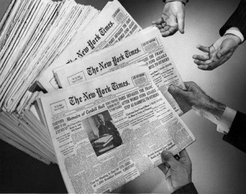 Close-up human hands holding newspapers Poster Print - Item # VARSAL25539067