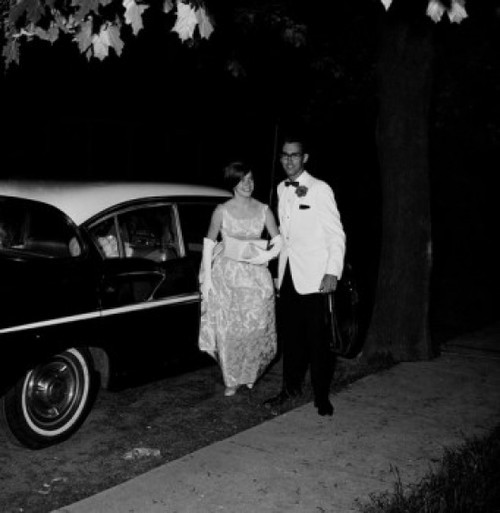 Teenage couple in formal clothes next to car Poster Print - Item # VARSAL255422361