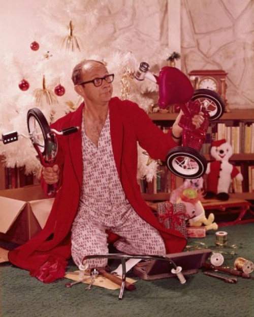 Mature man on his knees and holding parts of a tricycle Poster Print - Item # VARSAL3811362433