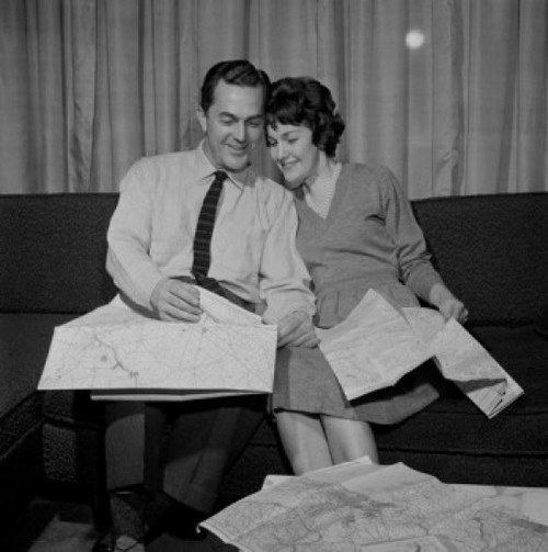 Mature couple reading maps Poster Print - Item # VARSAL255422689