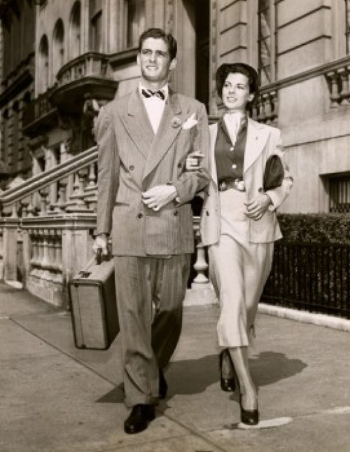 Young couple walking together on the sidewalk Poster Print - Item # VARSAL2553519