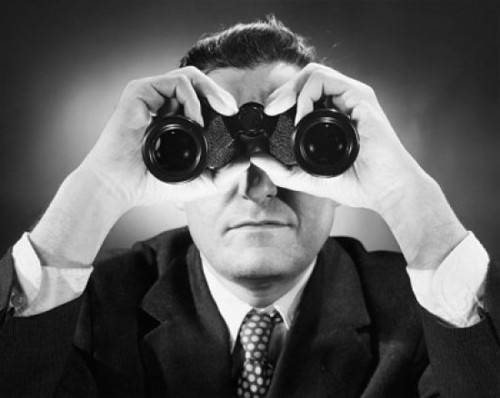 Close-up of a man looking through binoculars Poster Print - Item # VARSAL2553055A