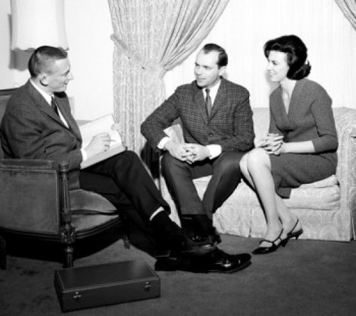 Couple talking to men in living room Poster Print - Item # VARSAL2557265