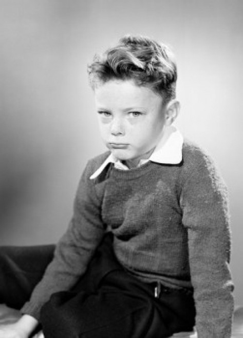 Studio portrait of school boy sulking Poster Print - Item # VARSAL255420281