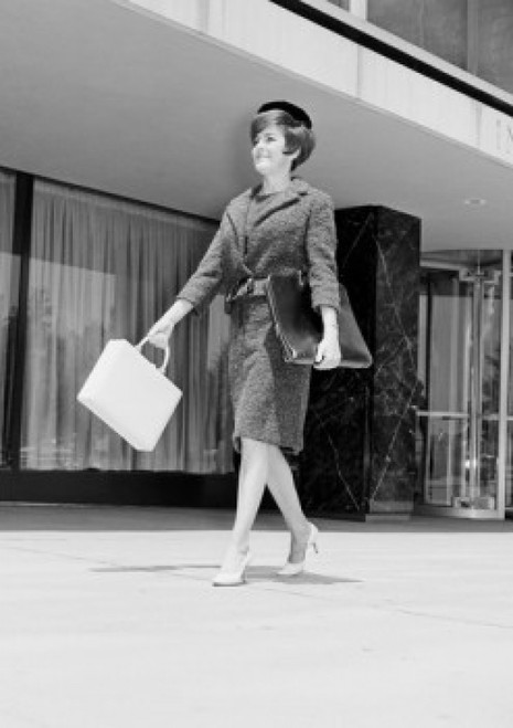 Elegant woman on street Poster Print - Item # VARSAL255421913