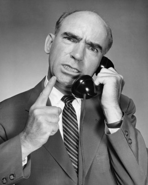 Mature businessman talking on telephone Poster Print - Item # VARSAL25548234