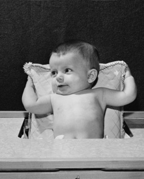 Baby sitting in a high chair Poster Print - Item # VARSAL2559715B