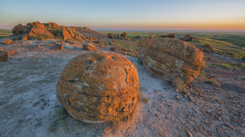 Sunset Over The Rocks At Red Rock Coulee; Alberta, Canada PosterPrint - Item # VARDPI2353448
