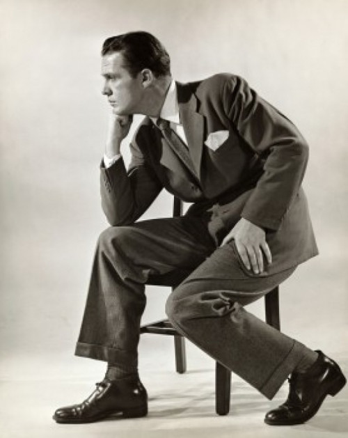 Businessman sitting on a chair thinking Poster Print - Item # VARSAL25516186