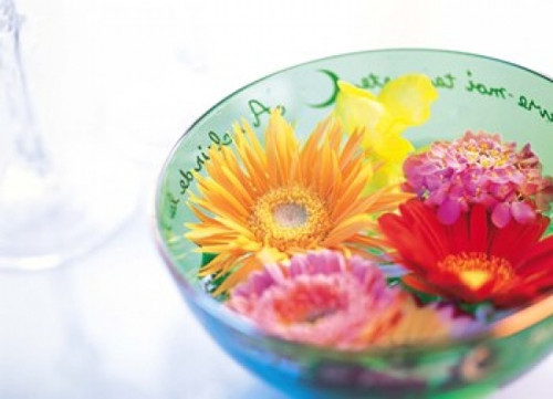 Pink  orange and yellow flowers floating in a blue bowl Poster Print by Panoramic Images (36 x 27) - Item # PPI117892