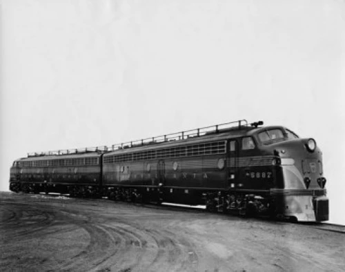 Train on a railroad track Poster Print
