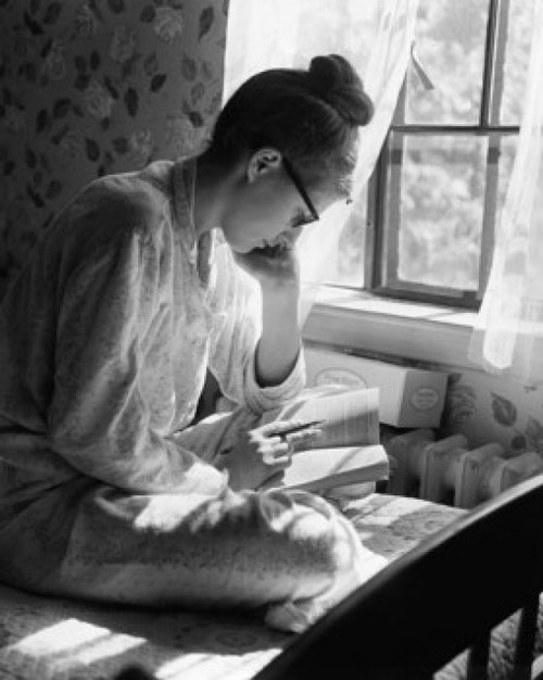 Side profile of a young woman studying Poster Print - Item # VARSAL25522489