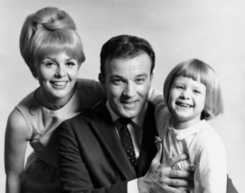 Mid adult couple with their daughter smiling Poster Print - Item # VARSAL2557312 Mid adult couple with their daughter smiling Poster Print - Item # VARSAL2557312