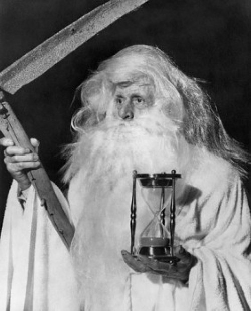 Close-up of senior man holding hourglass and scythe Poster Print - Item # VARSAL2555323