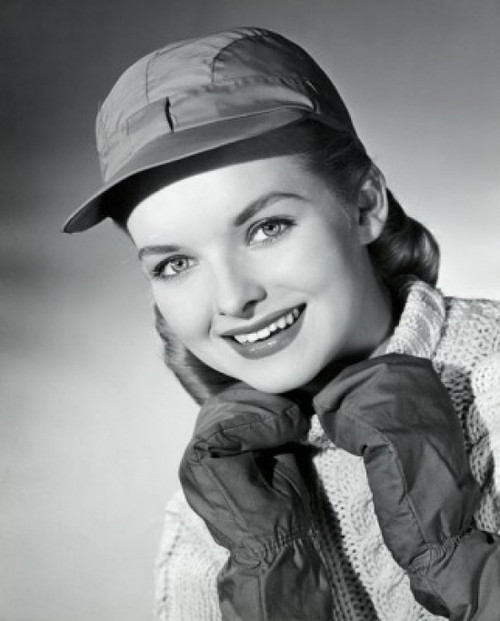 Portrait of a young woman smiling with her hands on her chin Poster Print - Item # VARSAL25541513