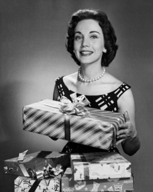 Close-up of a mid adult woman carrying a stack of gifts Poster Print - Item  # VARSAL25528995 - Posterazzi