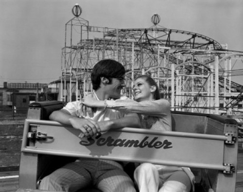 Young couple in amusement park Poster Print - Item # VARSAL255416300