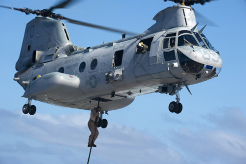 Pacific Ocean, December 2, 2011 - Marines fast rope from a CH-46 Sea Knight onto the amphibious transport dock ship USS New Orleans. Poster Print - Item # VARPSTSTK105236M