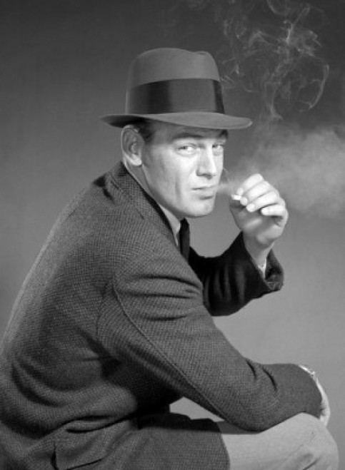 Studio portrait of man wearing hat  smoking cigarette Poster Print - Item # VARSAL2556657