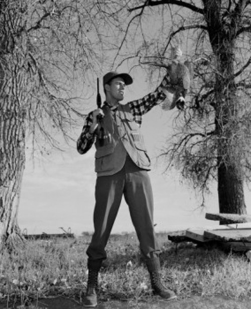 Portrait of hunter holding dead Wood Grouse Poster Print - Item # VARSAL255421141