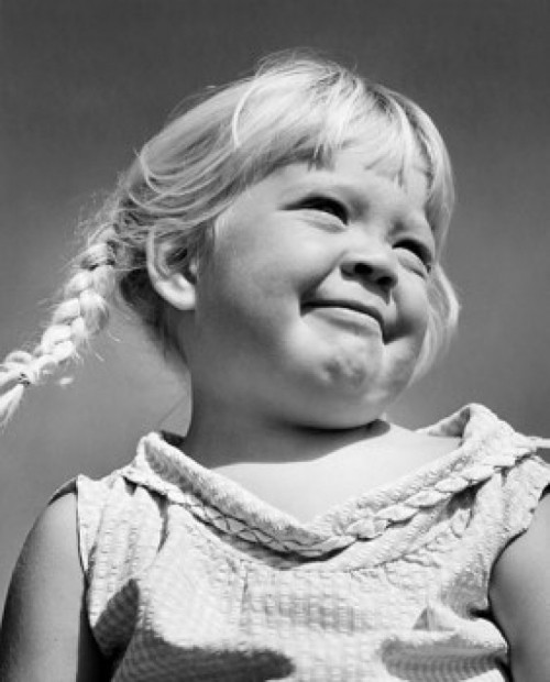 Close-up of a girl smirking Poster Print - Item # VARSAL2556721B