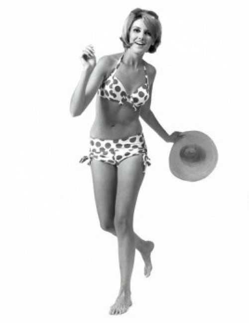 Portrait of a young woman in a bikini smiling Poster Print - Item # VARSAL25521141A