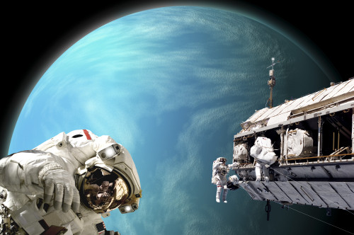 An artist's depiction of a team of astronauts performing work on a space station while orbiting a large, water covered alien planet Poster Print - Item # VARPSTMRC200086S