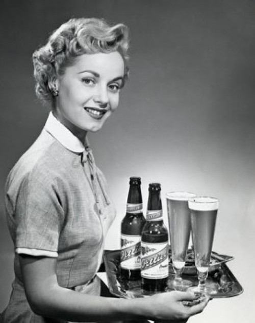Portrait of a waitress carrying beer on a tray Poster Print - Item # VARSAL25525211
