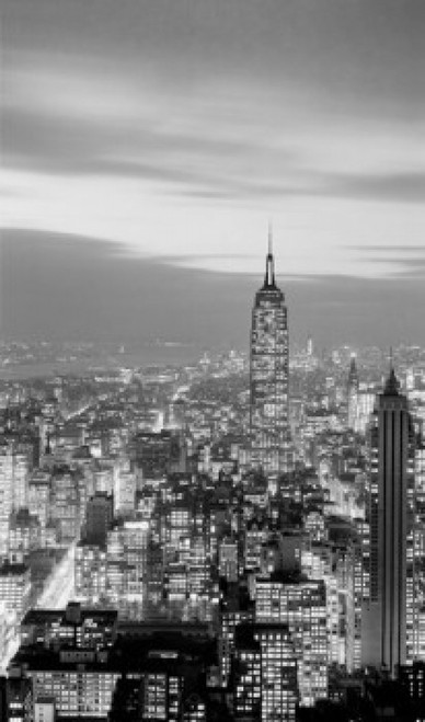 USA New York State New York City Night view over Midtown and Lower areas of  Manhattan with Empire State building silhouetted against the evening sky