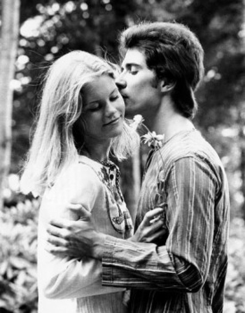 Side profile of young man kissing a young woman Poster Print - Item # VARSAL25518429