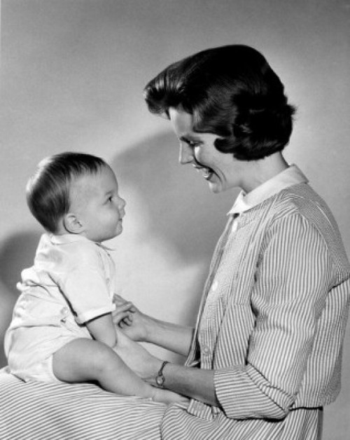 Side view of young woman and baby boy sitting on lap Poster Print - Item # VARSAL2559807