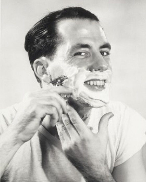 Portrait of a mid adult man shaving Poster Print - Item # VARSAL2553060