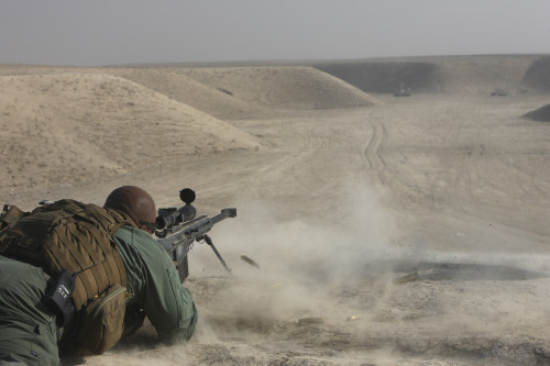 A U.S. Army soldier fires a Barrett M82A1 rifle on a firing range in Kunduz, Afghanistan Poster Print - Item # VARPSTTMO100425M