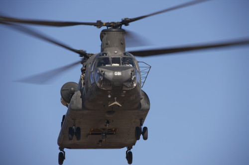 CH-47 Chinook flies over the Playas Training Area, New Mexico during exercise Angel Thunder 2013 Poster Print - Item # VARPSTTMO101028M