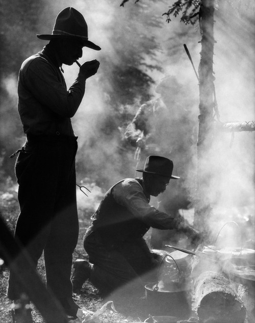 1920s Three Men Cowboys Camping One Man Smoking Pipe One Man Cooking Over Campfire Moody Silhouette Print By Vintage - Item # PPI178084LARGE