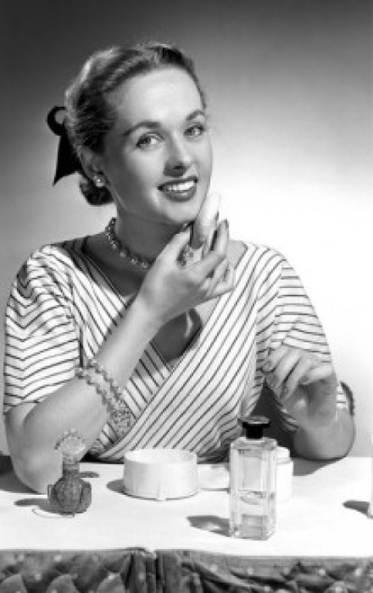 Portrait of beautiful woman applying make-up Poster Print - Item # VARSAL255417095