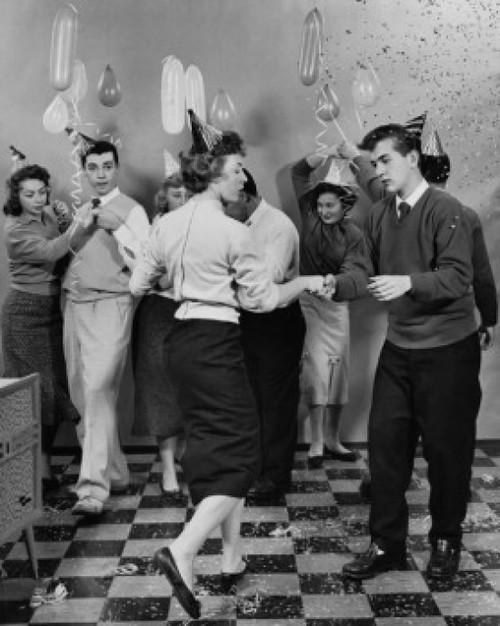 Teenage couples dancing at a new year's party Poster Print - Item # VARSAL2556766