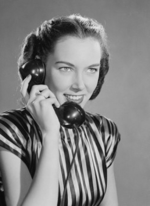 Attractive young woman talking on the phone Poster Print - Item # VARSAL255418879