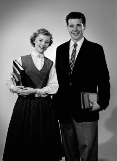 Portrait of male and female students holding books Poster Print - Item # VARSAL255418988