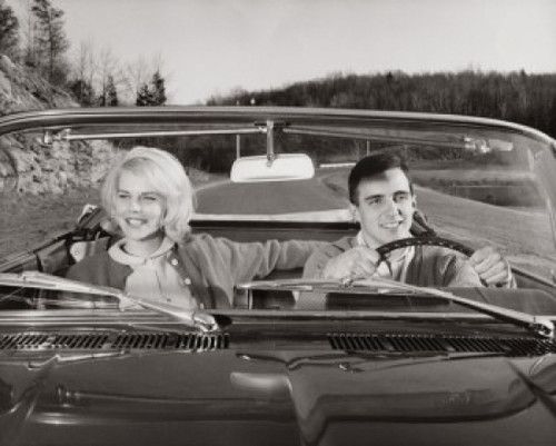 Close-up of a young couple sitting in a car Poster Print - Item # VARSAL2557921