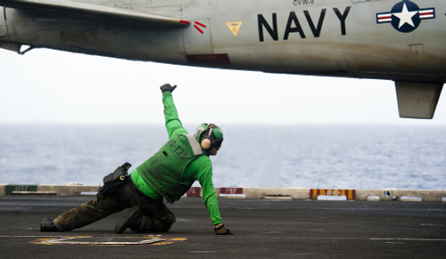 Pacific Ocean, February 8, 2012 - Final checker signals for the launching of an EA-6B Prowler on the flight deck of the Nimitz-class aircraft carrier USS John C. Stennis Poster Print - Item # VARPSTSTK105276M