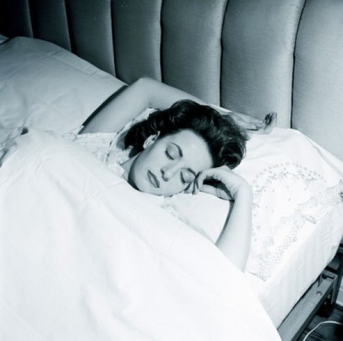 Woman sleeping in bed Poster Print - Item # VARSAL255417196