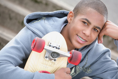A Boy With A Skateboard; Oregon, Usa PosterPrint