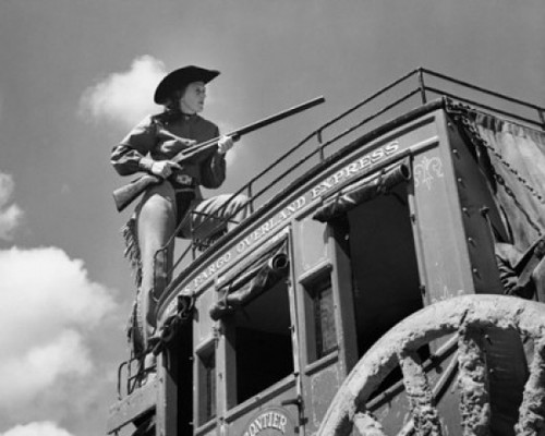 Calamity Jane riding shotgun on stage Poster Print - Item # VARSAL2557011